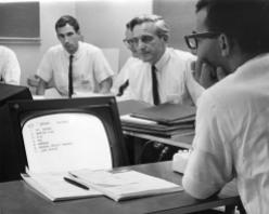 Doug using NLS for meeting support (1967)